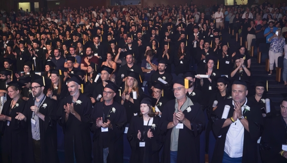 The audience pays tribute to Zechariah Haber. Photo: Invision